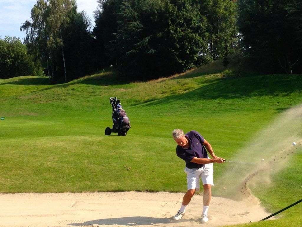 ball striking golf swing bunker 2
